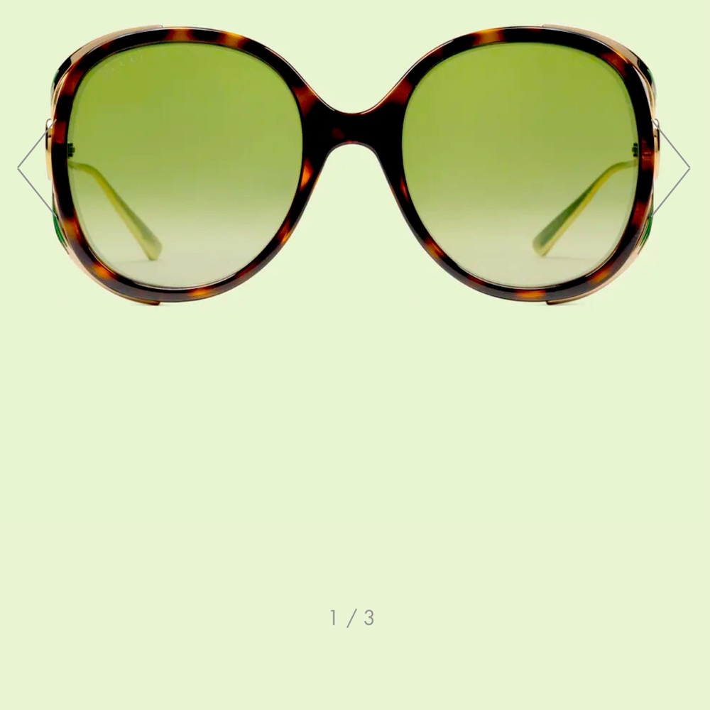 Gucci Round frame interlocking G sunglasses. Purchased at Farfetch.